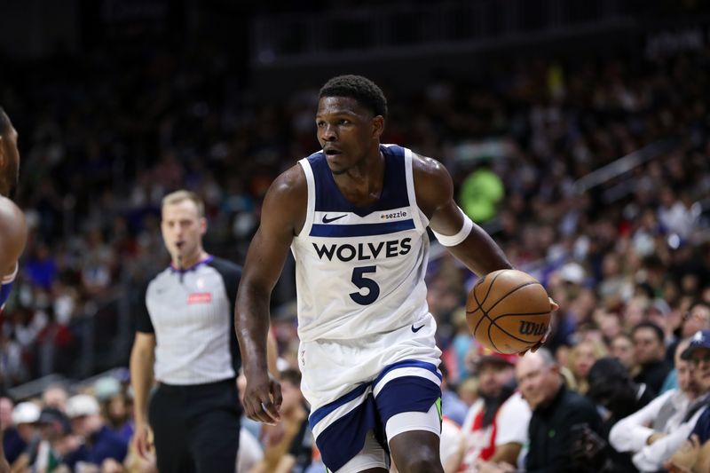 DES MOINES, IA -  OCTOBER 11: Anthony Edwards #5 of the Minnesota Timberwolves handles the ball during the game against the Philadelphia 76ers during a NBA pre season game on October 11, 2024 at the Wells Fargo Arena in Des Moines, Iowa. NOTE TO USER: User expressly acknowledges and agrees that, by downloading and or using this Photograph, user is consenting to the terms and conditions of the Getty Images License Agreement. Mandatory Copyright Notice: Copyright 2024 NBAE (Photo by Jasey Bradwell/NBAE via Getty Images)