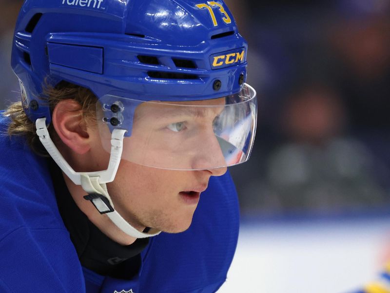 Dec 20, 2025; Buffalo, New York, USA;  Buffalo Sabres defenseman Zach Metsa (73) waits for the face-off during the third period against the New York Islanders at KeyBank Center. Mandatory Credit: Timothy T. Ludwig-Imagn Images