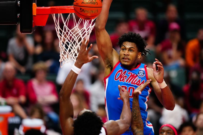 Nov 24, 2022; Orlando, Florida, USA; Mississippi Rebels forward Jayveous McKinnis (0) blocks a shot against the Stanford Cardinal during the second half at State Farm Field House. Mandatory Credit: Rich Storry-USA TODAY Sports