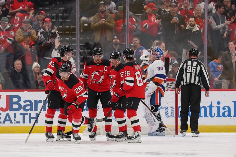Nov 10, 2025; Newark, New Jersey, USA; New Jersey Devils right wing Timo Meier (28) celebrates his goal against the New York Islanders during the first period at Prudential Center. Mandatory Credit: Ed Mulholland-Imagn Images