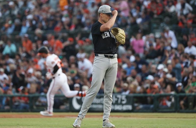 Mar 20, 2025; Sarasota, Florida, USA; New York Yankees starting pitcher Will Warren (98)  looks on after he gave up a home run to Baltimore Orioles first base Ryan O'Hearn (32) during the first inning at Ed Smith Stadium. Mandatory Credit: Kim Klement Neitzel-Imagn Images