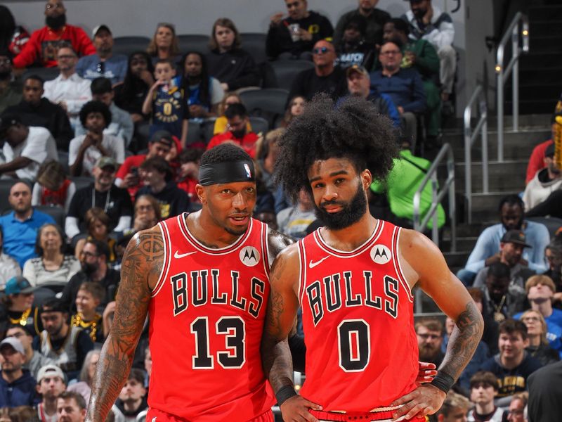 INDIANAPOLIS, IN - MARCH 13:  Torrey Craig #13 of Chicago Bulls & Coby White #0 of the Chicago Bulls looks on during the game on March 13, 2024 at Gainbridge Fieldhouse in Indianapolis, Indiana. NOTE TO USER: User expressly acknowledges and agrees that, by downloading and or using this Photograph, user is consenting to the terms and conditions of the Getty Images License Agreement. Mandatory Copyright Notice: Copyright 2024 NBAE (Photo by Ron Hoskins/NBAE via Getty Images)