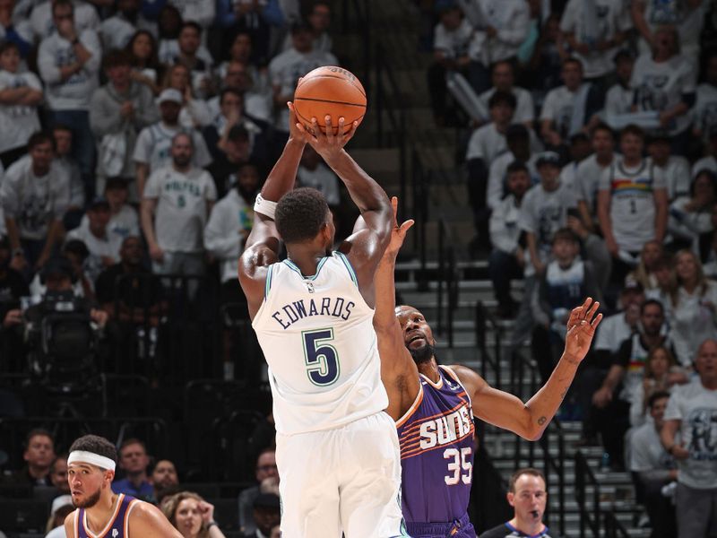 MINNEAPOLIS, MN -  APRIL 23: Anthony Edwards #5 of the Minnesota Timberwolves shoots the ball during the game against the Phoenix Suns during Round 1 Game 2 of the 2024 NBA Playoffs on April 23, 2024 at Target Center in Minneapolis, Minnesota. NOTE TO USER: User expressly acknowledges and agrees that, by downloading and or using this Photograph, user is consenting to the terms and conditions of the Getty Images License Agreement. Mandatory Copyright Notice: Copyright 2024 NBAE (Photo by David Sherman/NBAE via Getty Images)