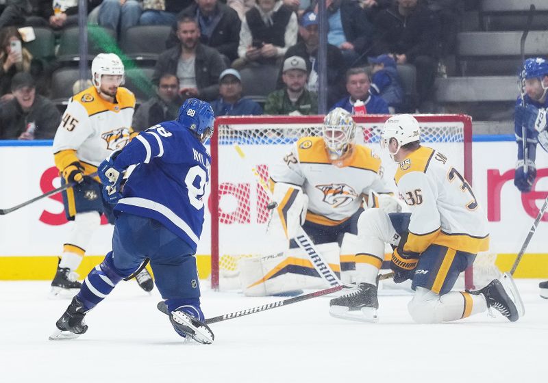 Dec 9, 2023; Toronto, Ontario, CAN; Toronto Maple Leafs right wing William Nylander (88) shoots the puck on Nashville Predators goaltender Kevin Lankinen (32) during the second period at Scotiabank Arena. Mandatory Credit: Nick Turchiaro-USA TODAY Sports