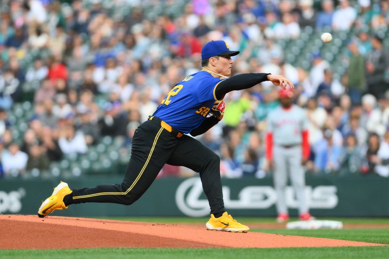 May 31, 2024; Seattle, Washington, USA; Seattle Mariners starting pitcher Bryan Woo (22) pitches to the Los Angeles Angels during the first inning at T-Mobile Park. Mandatory Credit: Steven Bisig-USA TODAY Sports