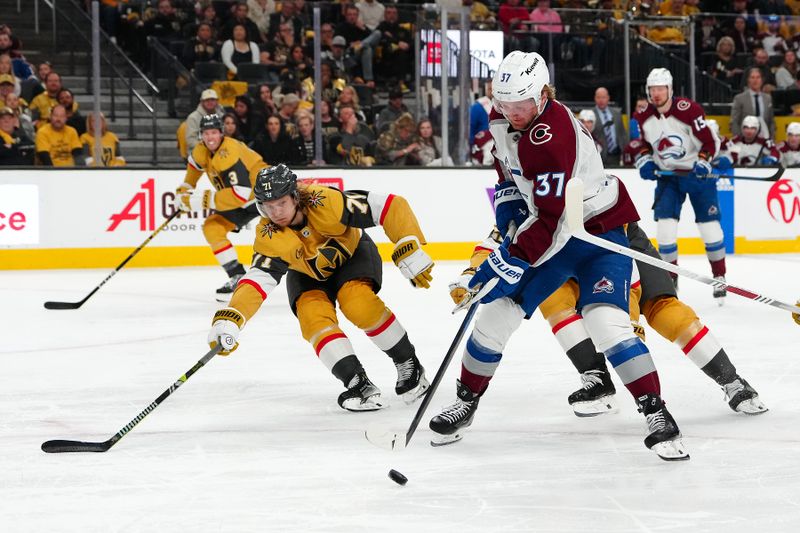 Apr 14, 2024; Las Vegas, Nevada, USA; Colorado Avalanche center Casey Mittelstadt (37) controls the puck as Vegas Golden Knights center William Karlsson (71) defends against a pass during the second period at T-Mobile Arena. Mandatory Credit: Stephen R. Sylvanie-USA TODAY Sports