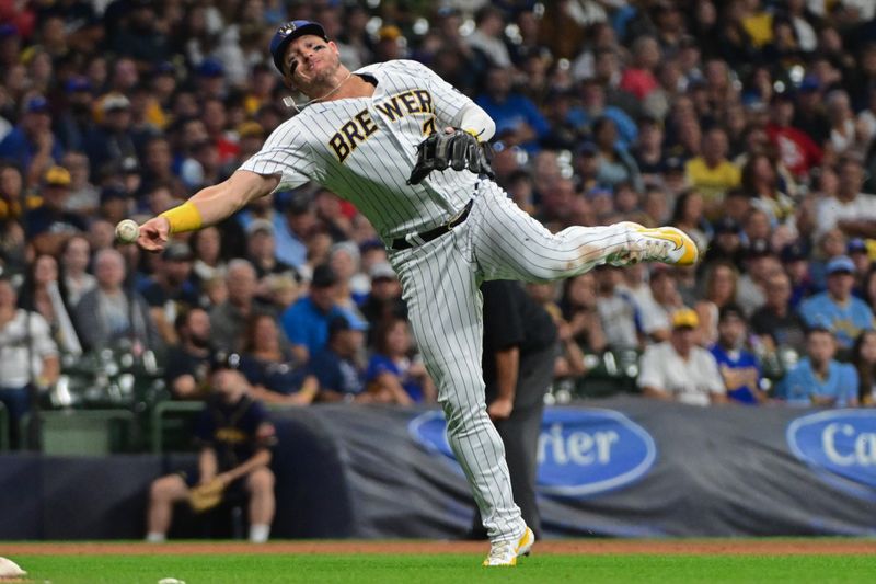 Sep 16, 2023; Milwaukee, Wisconsin, USA; Milwaukee Brewers third baseman Josh Donaldson (3) can't throw out Washington Nationals designated hitter Joey Meneses (45) who reached on an infield hit in the eighth inning at American Family Field. Mandatory Credit: Benny Sieu-USA TODAY Sports