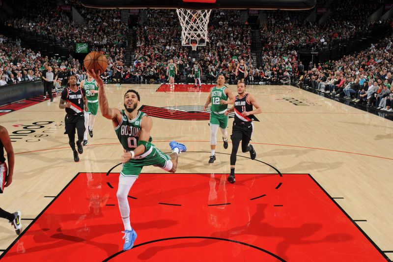 PORTLAND, OR - MARCH 17: Jayson Tatum #0 of the Boston Celtics drives to the basket during the game against the Portland Trail Blazers on March 17, 2023 at the Moda Center Arena in Portland, Oregon. NOTE TO USER: User expressly acknowledges and agrees that, by downloading and or using this photograph, user is consenting to the terms and conditions of the Getty Images License Agreement. Mandatory Copyright Notice: Copyright 2023 NBAE (Photo by Cameron Browne/NBAE via Getty Images)