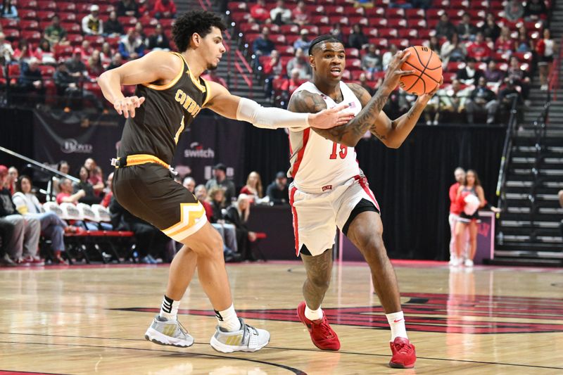 Feb 3, 2024; Las Vegas, Nevada, USA; UNLV Rebels guard Luis Rodriguez (15) makes a pass past Wyoming Cowboys guard Brendan Wenzel (1) in the first half at Thomas & Mack Center. Mandatory Credit: Candice Ward-USA TODAY Sports