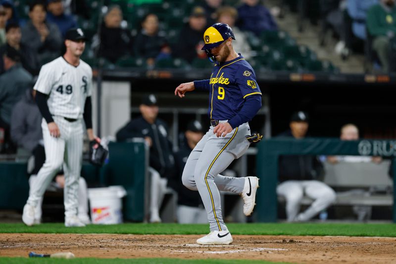 Apr 30, 2025; Chicago, Illinois, USA; Milwaukee Brewers left fielder Jake Bauers (9) scores against the Chicago White Sox during the eight inning at Rate Field. Mandatory Credit: Kamil Krzaczynski-Imagn Images