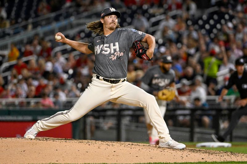 Apr 14, 2023; Washington, District of Columbia, USA; Washington Nationals relief pitcher Hunter Harvey (73) throws to the Cleveland Guardians during the seventh inning at Nationals Park. Mandatory Credit: Brad Mills-USA TODAY Sports