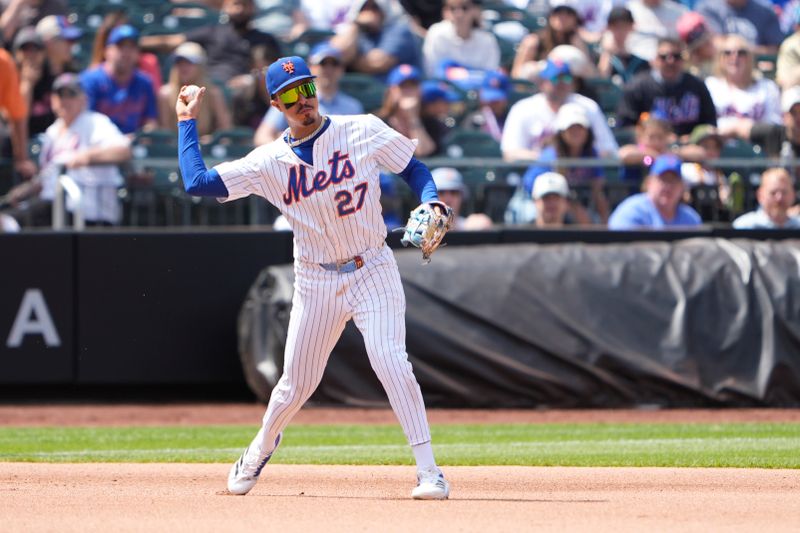 May 1, 2025; New York City, New York, USA; New York Mets third baseman Mark Vientos (27) throws to second base to record after fielding a ground ball hit by Arizona Diamondbacks third baseman Eugenio Suarez (28) (not pictured) during the fourth inning at Citi Field. Mandatory Credit: Gregory Fisher-Imagn Images