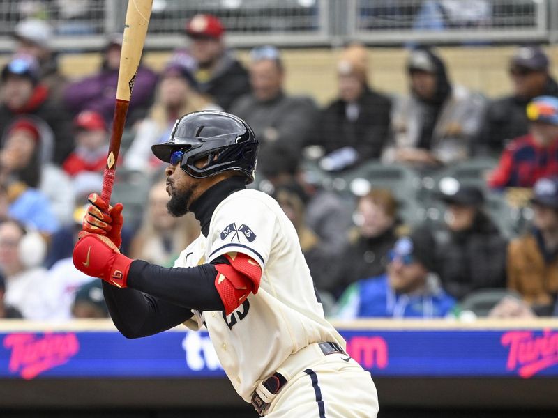 Apr 23, 2023; Minneapolis, Minnesota, USA;  Minnesota Twins designated hitter Byron Buxton (25) hits a single against the Washington Nationals during the seventh inning at Target Field. Mandatory Credit: Nick Wosika-USA TODAY Sports