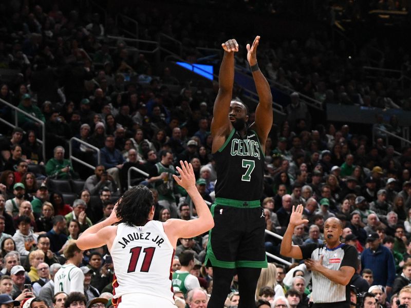 BOSTON, MASSACHUSETTS - DECEMBER 02: Jaylen Brown #7 of the Boston Celtics attemps a three-point shot in front of Jaime Jaquez Jr. #11 of the Miami Heat during the third quarter at the TD Garden on December 02, 2024 in Boston, Massachusetts. NOTE TO USER: User expressly acknowledges and agrees that, by downloading and or using this photograph, User is consenting to the terms and conditions of the Getty Images License Agreement. (Photo by Brian Fluharty/Getty Images)