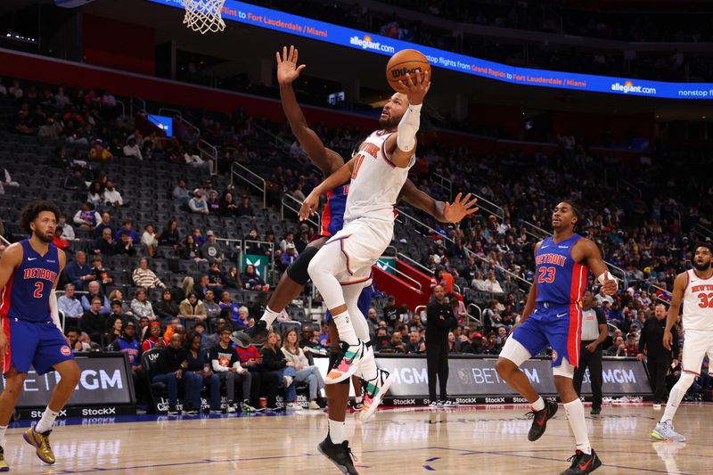 DETROIT, MICHIGAN - NOVEMBER 01: Jalen Brunson #11 of the New York Knicks drives to the basket past Isaiah Stewart #28 of the Detroit Pistons during the second half at Little Caesars Arena on November 01, 2024 in Detroit, Michigan. NOTE TO USER: User expressly acknowledges and agrees that, by downloading and or using this photograph, User is consenting to the terms and conditions of the Getty Images License. (Photo by Gregory Shamus/Getty Images)