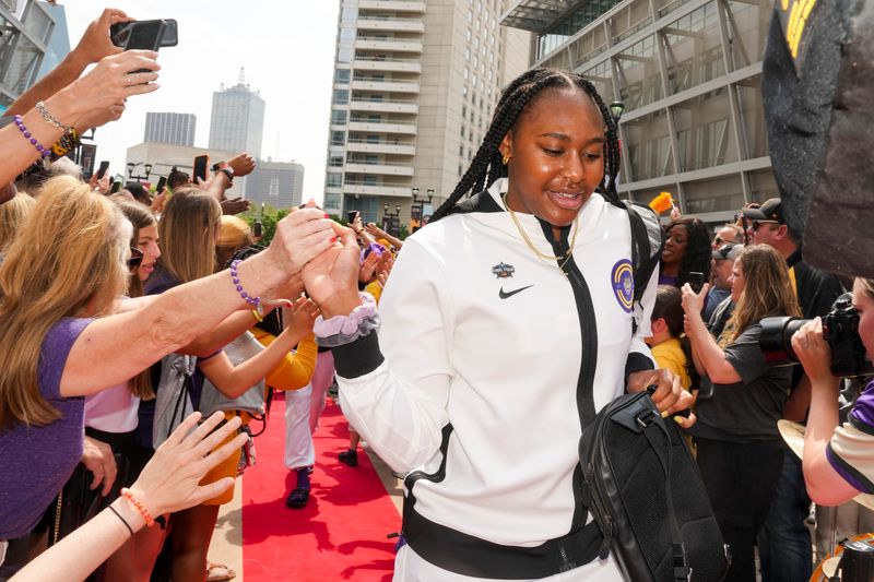 Apr 2, 2023; Dallas, TX, USA; LSU Lady Tigers forward Alisa Williams (15) high-fives fans prior to their game against the Iowa Hawkeyes during the final round of the Women's Final Four NCAA tournament at the American Airlines Center. Mandatory Credit: Kirby Lee-USA TODAY Sports