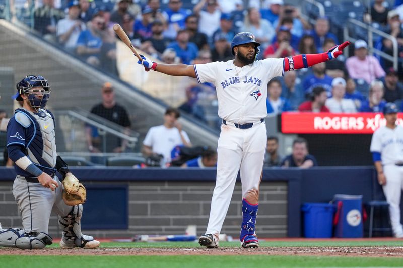 May 15, 2025; Toronto, Ontario, CAN; Toronto Blue Jays first base Vladimir Guerrero Jr. (27) calls for time out during the eighth inning against the Tampa Bay Rays at Rogers Centre. Mandatory Credit: Kevin Sousa-Imagn Images