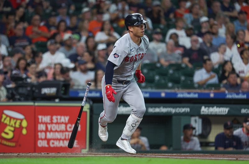 Aug 19, 2024; Houston, Texas, USA; Boston Red Sox left fielder Rob Refsnyder (30) hits a single during the first inning against the Houston Astros at Minute Maid Park. Mandatory Credit: Troy Taormina-USA TODAY Sports