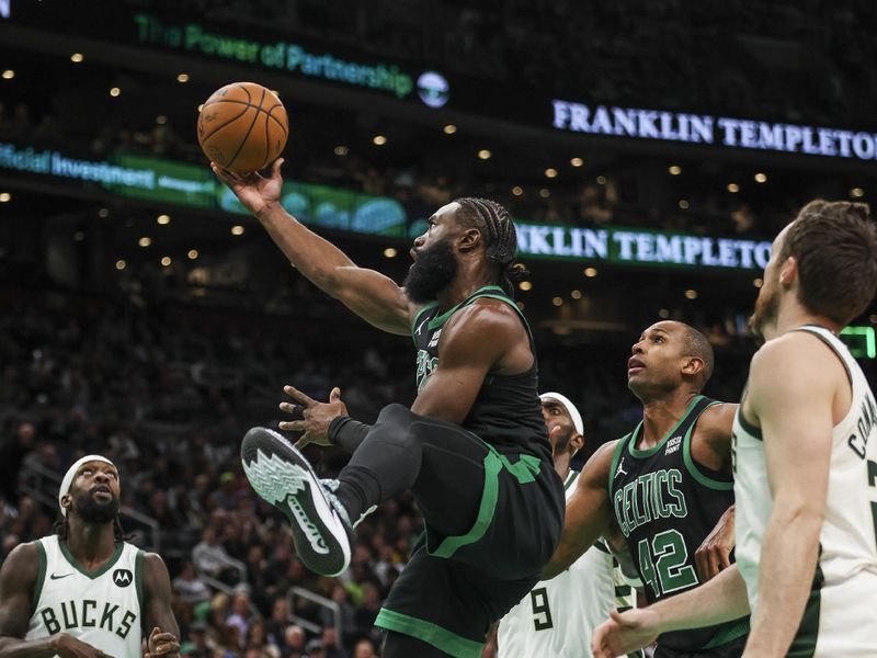 BOSTON, MA - MARCH 20:  Jaylen Brown #7 of the Boston Celtics drives to the basket in the third quarter against the Milwaukee Bucks at TD Garden on March 20, 2024 in Boston, Massachusetts. NOTE TO USER: User expressly acknowledges and agrees that, by downloading and or using this photograph, User is consenting to the terms and conditions of the Getty Images License Agreement. (Photo by Adam Glanzman/Getty Images)