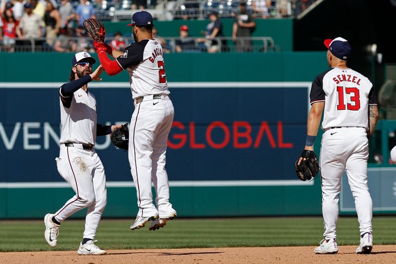 Jun 9, 2024; Washington, District of Columbia, USA; Washington Nationals second baseman Luis Garcia Jr. (2) celebrates with Nationals left fielder Jesse Winker (6) after their game against the Atlanta Braves at Nationals Park. Mandatory Credit: Geoff Burke-USA TODAY Sports