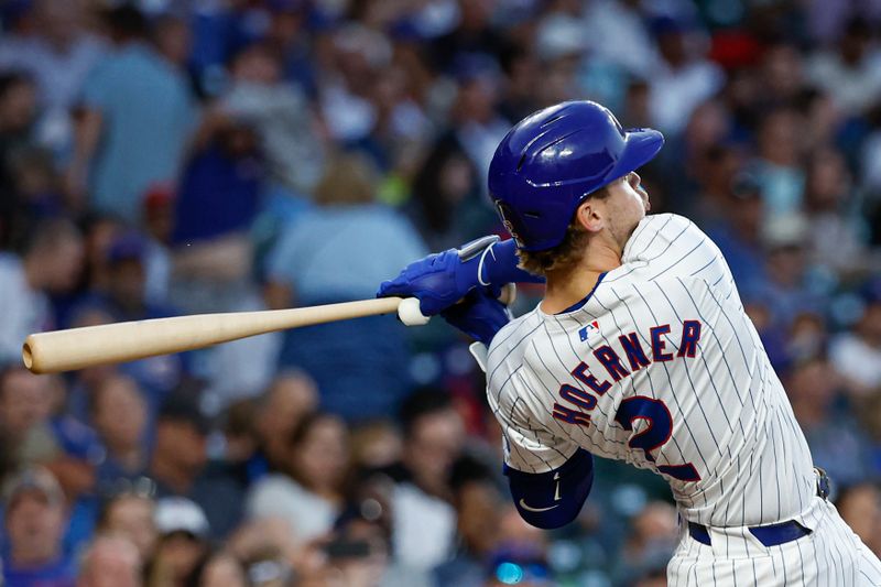 Sep 4, 2024; Chicago, Illinois, USA; Chicago Cubs second baseman Nico Hoerner (2) singles against the Pittsburgh Pirates during the second inning at Wrigley Field. Mandatory Credit: Kamil Krzaczynski-Imagn Images