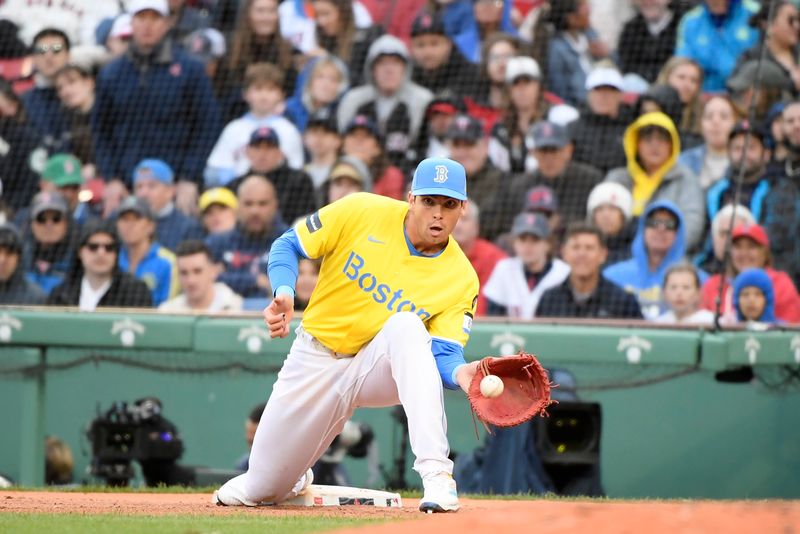 Apr 13, 2024; Boston, Massachusetts, USA;  Boston Red Sox first baseman Triston Casas (36) fields the ball for an out during the eighth inning against the Los Angeles Angels at Fenway Park. Mandatory Credit: Bob DeChiara-USA TODAY Sports