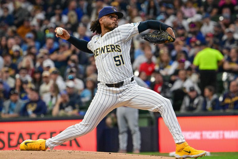 May 11, 2024; Milwaukee, Wisconsin, USA;  Milwaukee Brewers pitcher Freddy Peralta (51) throws against the St. Louis Cardinals in the first inning at American Family Field. Mandatory Credit: Benny Sieu-USA TODAY Sports