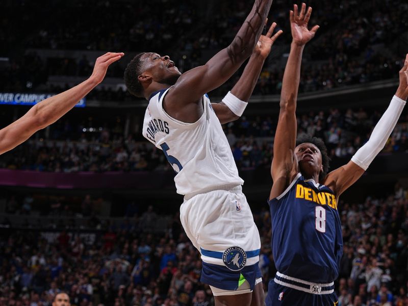 DENVER, CO - APRIL 10: Anthony Edwards #5 of the Minnesota Timberwolves shoots the ball during the game against the Denver Nuggets on April 10, 2024 at the Ball Arena in Denver, Colorado. NOTE TO USER: User expressly acknowledges and agrees that, by downloading and/or using this Photograph, user is consenting to the terms and conditions of the Getty Images License Agreement. Mandatory Copyright Notice: Copyright 2024 NBAE (Photo by Bart Young/NBAE via Getty Images)