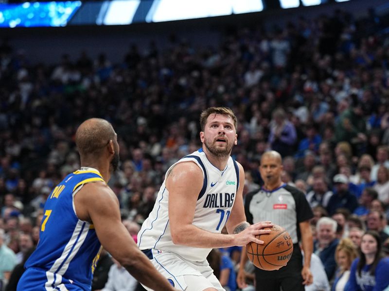 DALLAS, TX - MARCH 13: Luka Doncic #77 of the Dallas Mavericks shoots the ball during the game against the Golden State Warriors on March 13, 2024 at the American Airlines Center in Dallas, Texas. NOTE TO USER: User expressly acknowledges and agrees that, by downloading and or using this photograph, User is consenting to the terms and conditions of the Getty Images License Agreement. Mandatory Copyright Notice: Copyright 2024 NBAE (Photo by Glenn James/NBAE via Getty Images)