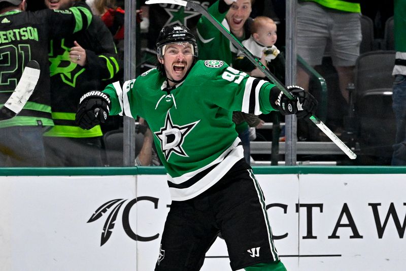 Nov 14, 2023; Dallas, Texas, USA; Dallas Stars center Matt Duchene (95) celebrates after he scores the game winning goal against the Arizona Coyotes during the overtime period at the American Airlines Center. Mandatory Credit: Jerome Miron-USA TODAY Sports