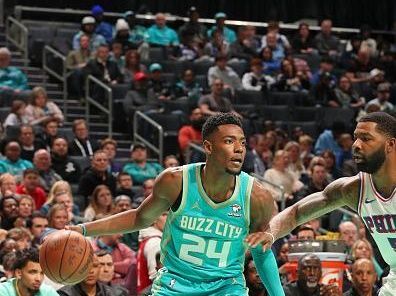 CHARLOTTE, NC - DECEMBER 16: Brandon Miller #24 of the Charlotte Hornets dribbles the ball during the game against the Philadelphia 76ers on December 16, 2023 at Spectrum Center in Charlotte, North Carolina. NOTE TO USER: User expressly acknowledges and agrees that, by downloading and or using this photograph, User is consenting to the terms and conditions of the Getty Images License Agreement. Mandatory Copyright Notice: Copyright 2023 NBAE (Photo by Kent Smith/NBAE via Getty Images)