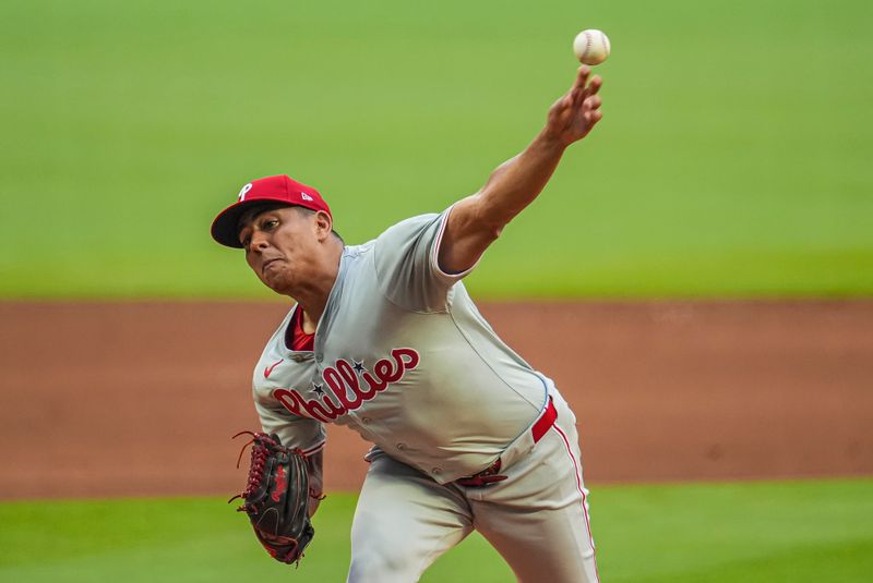 Jul 6, 2024; Cumberland, Georgia, USA; Philadelphia Phillies pitcher Ranger Suarez (55) pitches against the Atlanta Braves during the first inning at Truist Park. Mandatory Credit: Dale Zanine-USA TODAY Sports