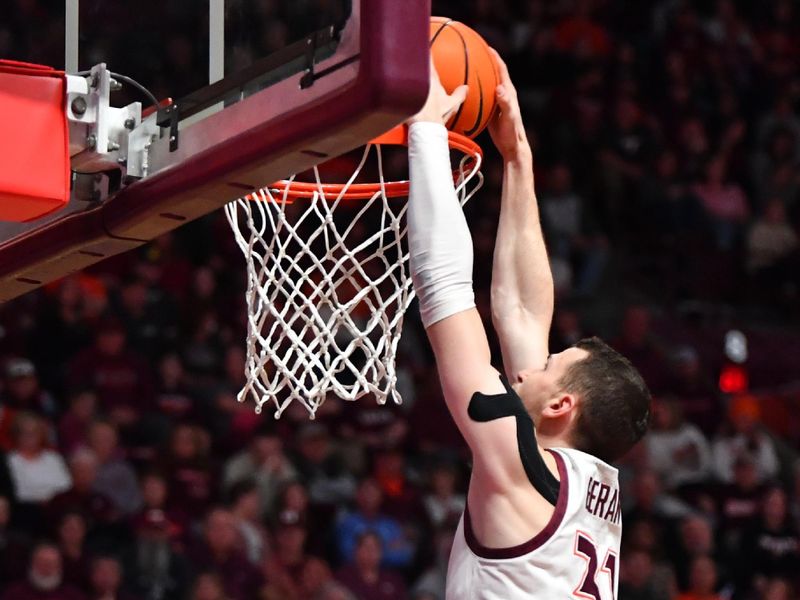 Jan 27, 2024; Blacksburg, Virginia, USA; Virginia Tech Hokies forward Robbie Beran (31) dunks during the second  half at Cassell Coliseum. Mandatory Credit: Brian Bishop-USA TODAY Sports