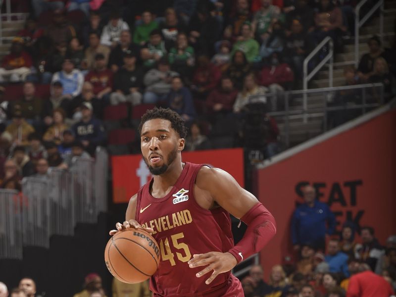 CLEVELAND, OH - DECEMBER 1: Donovan Mitchell #45 of the Cleveland Cavaliers dribbles the ball during the game against the Boston Celtics on December 1, 2024 at Rocket Mortgage FieldHouse in Cleveland, Ohio. NOTE TO USER: User expressly acknowledges and agrees that, by downloading and/or using this Photograph, user is consenting to the terms and conditions of the Getty Images License Agreement. Mandatory Copyright Notice: Copyright 2024 NBAE (Photo by David Liam Kyle/NBAE via Getty Images)