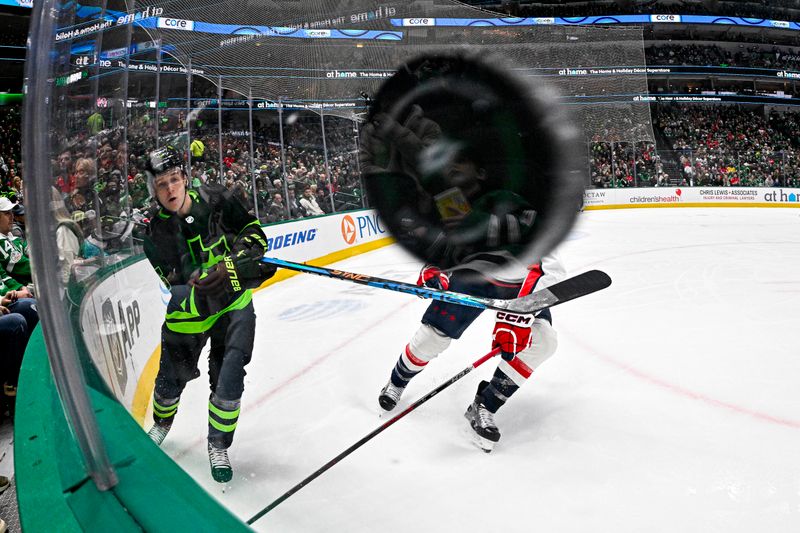 Jan 27, 2024; Dallas, Texas, USA; Dallas Stars defenseman Nils Lundkvist (5) clears the puck from the Dallas zone during the first period against the Washington Capitals at the American Airlines Center. Mandatory Credit: Jerome Miron-USA TODAY Sports