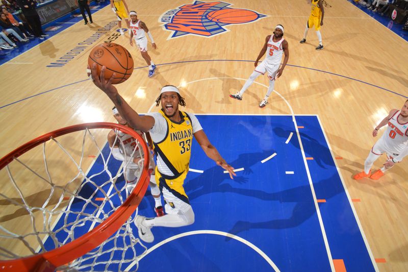 NEW YORK, NY - MAY 19: Myles Turner #33 of the Indiana Pacers drives to the basket during the game against the New York Knicks during Round 2 Game 7 of the 2024 NBA Playoffs on May 19, 2024 at Madison Square Garden in New York City, New York.  NOTE TO USER: User expressly acknowledges and agrees that, by downloading and or using this photograph, User is consenting to the terms and conditions of the Getty Images License Agreement. Mandatory Copyright Notice: Copyright 2024 NBAE  (Photo by Jesse D. Garrabrant/NBAE via Getty Images)