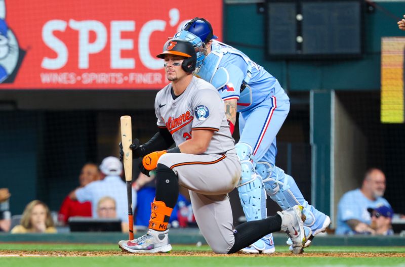 Jul 21, 2024; Arlington, Texas, USA;  Baltimore Orioles catcher James McCann (27) reacts after striking during the seventh inning against the Texas Rangers at Globe Life Field. Mandatory Credit: Kevin Jairaj-USA TODAY Sports