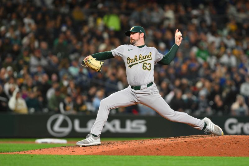 Sep 27, 2024; Seattle, Washington, USA; Oakland Athletics relief pitcher Hogan Harris (63) pitches to the Seattle Mariners during the seventh inning at T-Mobile Park. Mandatory Credit: Steven Bisig-Imagn Images