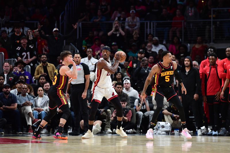 ATLANTA, GA - APRIL 9:Jimmy Butler #22 of the Miami Heat handles the ball during the game against the Atlanta Hawks  on April 9, 2024 at State Farm Arena in Atlanta, Georgia.  NOTE TO USER: User expressly acknowledges and agrees that, by downloading and/or using this Photograph, user is consenting to the terms and conditions of the Getty Images License Agreement. Mandatory Copyright Notice: Copyright 2024 NBAE (Photo by Scott Cunningham/NBAE via Getty Images)