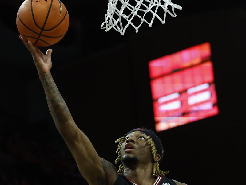 Mar 4, 2023; Charlottesville, Virginia, USA; Louisville Cardinals guard El Ellis (3) shoots the ball as Virginia Cavaliers guard Reece Beekman (2) looks on in the first half at John Paul Jones Arena. Mandatory Credit: Geoff Burke-USA TODAY Sports