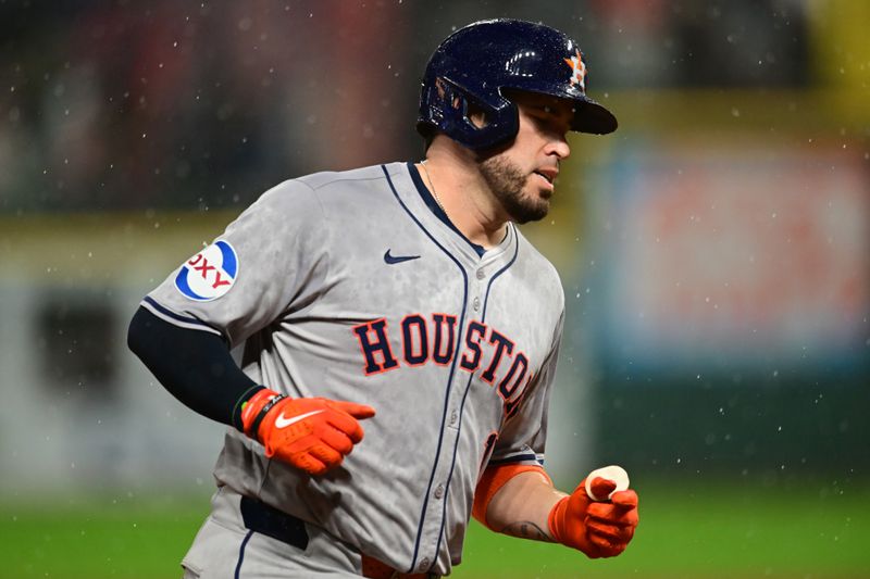 Sep 27, 2024; Cleveland, Ohio, USA; Houston Astros first baseman Victor Caratini (17) rounds the bases after hitting a home run during the fifth inning against the Cleveland Guardians at Progressive Field. Mandatory Credit: Ken Blaze-Imagn Images