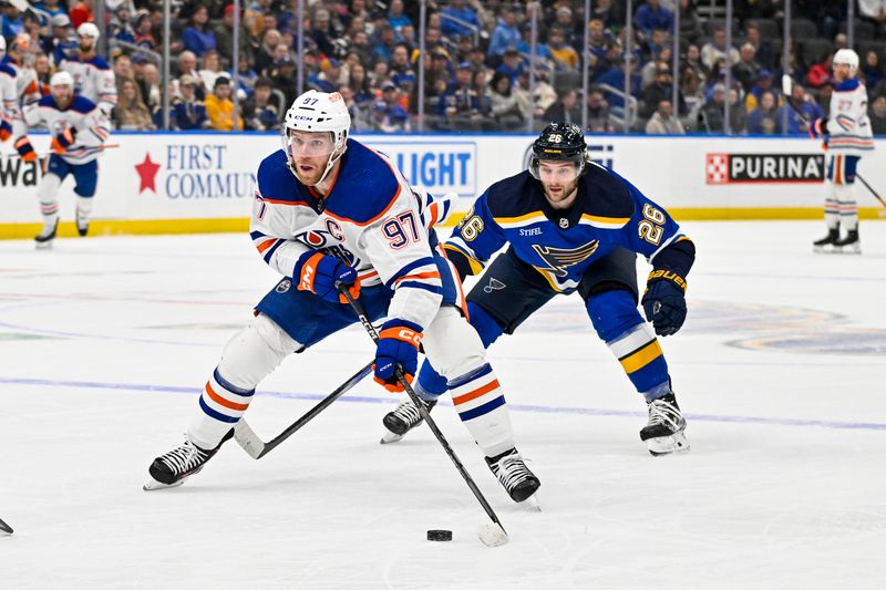 Feb 15, 2024; St. Louis, Missouri, USA;  Edmonton Oilers center Connor McDavid (97) controls the puck against the St. Louis Blues during the first period at Enterprise Center. Mandatory Credit: Jeff Curry-USA TODAY Sports