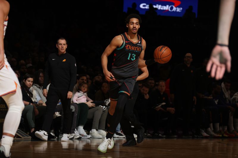 WASHINGTON, DC -? FEBRUARY 4: Jordan Poole #13 of the Washington Wizards dribbles the ball during the game against the Phoenix Suns on February 4, 2024 at Capital One Arena in Washington, DC. NOTE TO USER: User expressly acknowledges and agrees that, by downloading and or using this Photograph, user is consenting to the terms and conditions of the Getty Images License Agreement. Mandatory Copyright Notice: Copyright 2024 NBAE (Photo by Stephen Gosling/NBAE via Getty Images)