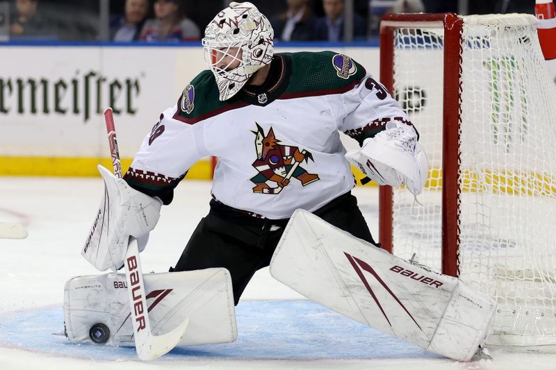 Oct 16, 2023; New York, New York, USA; Arizona Coyotes goaltender Connor Ingram (39) makes a save against the New York Rangers during the second period at Madison Square Garden. Mandatory Credit: Brad Penner-USA TODAY Sports