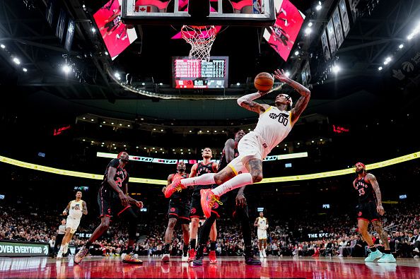 TORONTO, ON - DECEMBER 23: Jordan Clarkson #00 of the Utah Jazz shoots against the Toronto Raptors during the first half of their basketball game at the Scotiabank Arena on December 23, 2023 in Toronto, Ontario, Canada. NOTE TO USER: User expressly acknowledges and agrees that, by downloading and/or using this Photograph, user is consenting to the terms and conditions of the Getty Images License Agreement. (Photo by Mark Blinch/Getty Images)