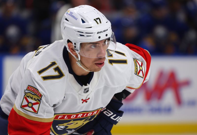 Oct 12, 2024; Buffalo, New York, USA;  Florida Panthers center Evan Rodrigues (17) waits for a face-off during the first period against the Buffalo Sabres at KeyBank Center. Mandatory Credit: Timothy T. Ludwig-Imagn Images