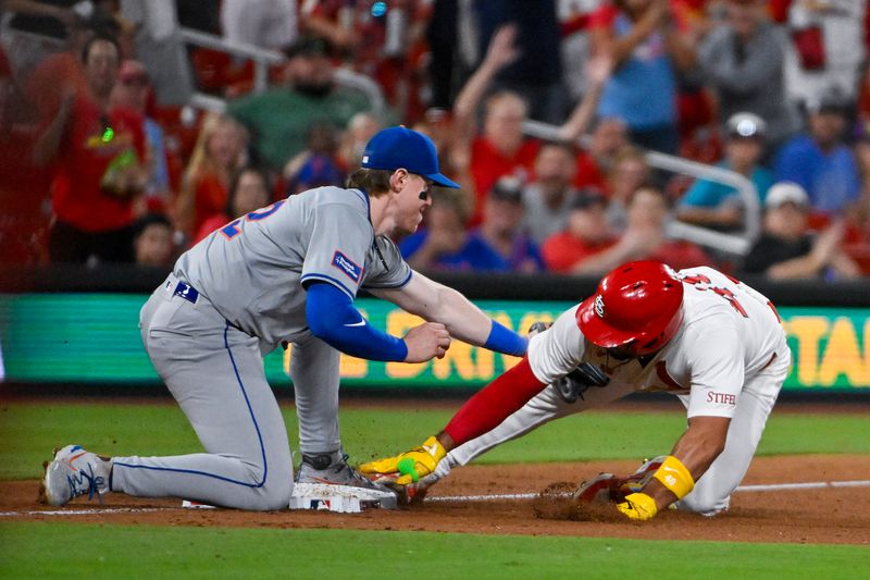 May 6, 2024; St. Louis, Missouri, USA;  New York Mets third baseman Brett Baty (22) tags out St. Louis Cardinals designated hitter Ivan Herrera (48) during the sixth inning at Busch Stadium. Mandatory Credit: Jeff Curry-USA TODAY Sports