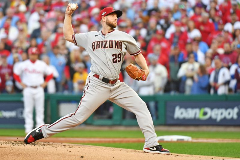 Oct 23, 2023; Philadelphia, Pennsylvania, USA; Arizona Diamondbacks starting pitcher Merrill Kelly (29) pitches during the first inning against the Philadelphia Phillies in game six of the NLCS for the 2023 MLB playoffs at Citizens Bank Park. Mandatory Credit: Eric Hartline-USA TODAY Sports