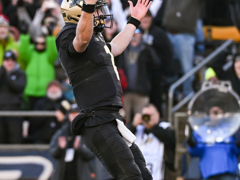 Nov 25, 2023; West Lafayette, Indiana, USA; Purdue Boilermakers quarterback Hudson Card (1) celebrates a touchdown run during the second half at Ross-Ade Stadium. Mandatory Credit: Robert Goddin-USA TODAY Sports