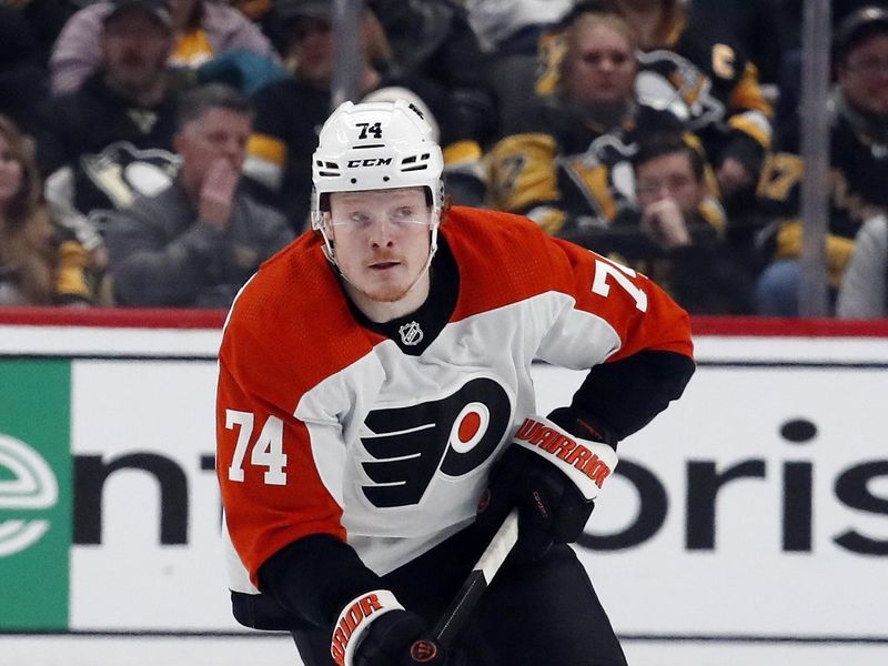 Feb 25, 2024; Pittsburgh, Pennsylvania, USA;  Philadelphia Flyers right wing Owen Tippett (74) skates spice with the puck against the Pittsburgh Penguins during the third period at PPG Paints Arena.  Pittsburgh won 7-6. Mandatory Credit: Charles LeClaire-USA TODAY Sports